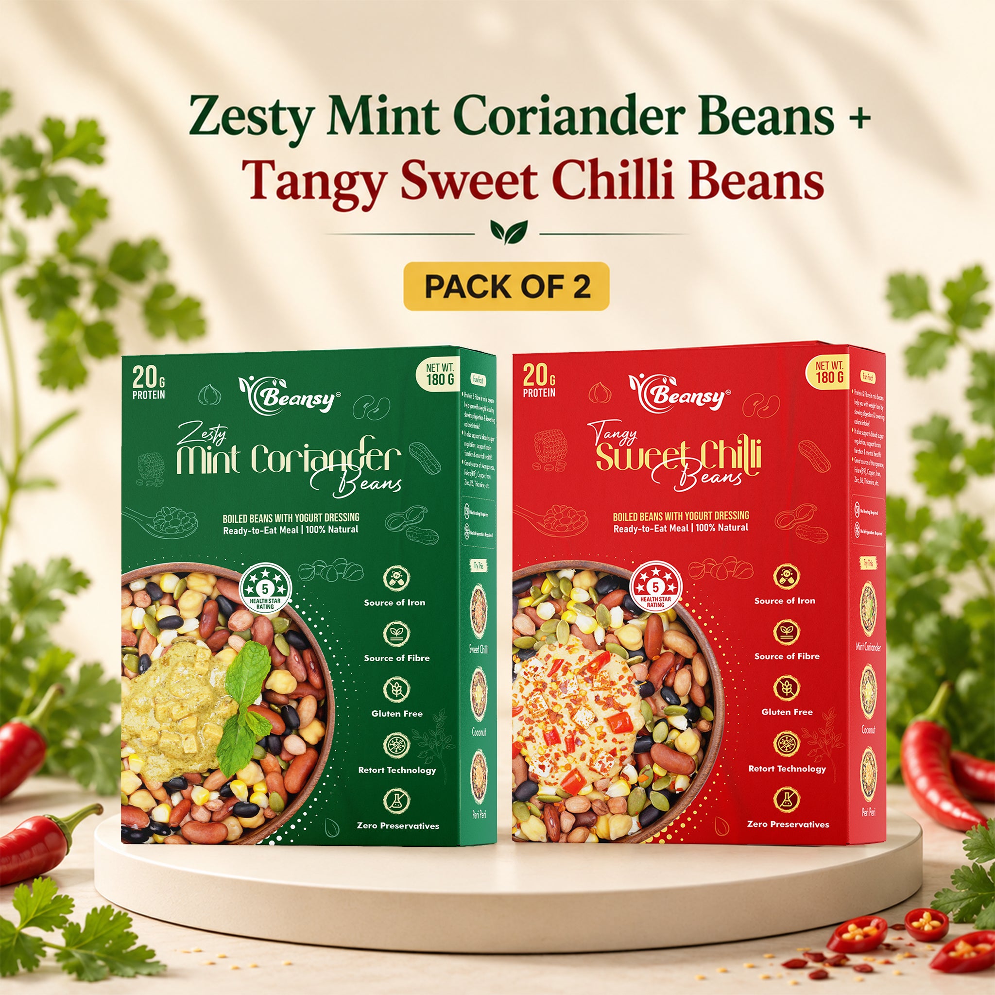 Two bean packaging boxes, one green and one red, with text 'Zesty Mint Coriander Beans' and 'Tangy Sweet Chilli Beans' respectively, on a neutral background.